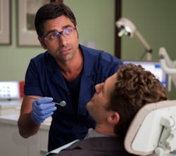 John Stamos as Carl Howell, D.D.S., in the hit TV show 'Glee.' Image courtesy of Fox.