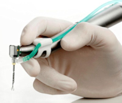 The SAF file with its irrigation tube attached to a KaVo handpiece.