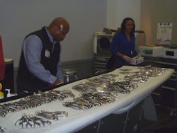 Volunteers sterilize and sort hundreds of dental instruments provided by RAM.