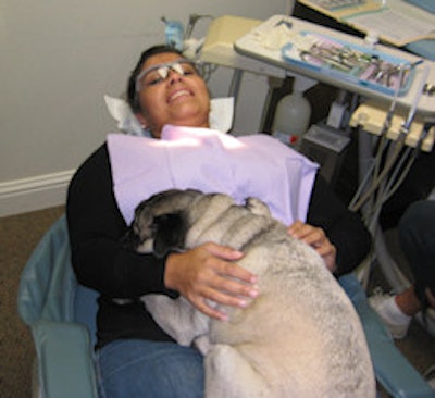 'He really calms me -- the love and the warmth in my lap,' patient Patricia Urbano said.