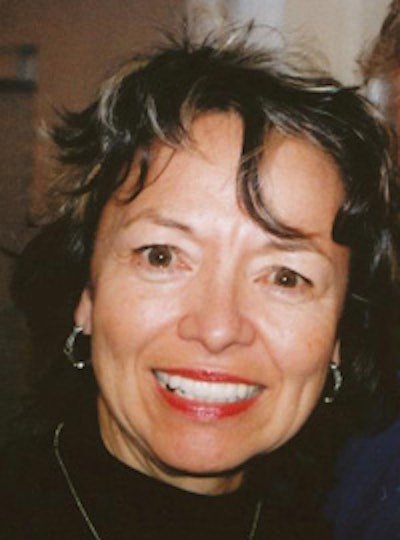 DrBicuspid.com Features Editor Donna Domino with a two-tooth gap among her lower molars