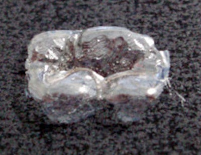 The hydroxyapatite film developed by researchers from Kinki University is ultrathin, flexible, and nearly invisible when applied to teeth. Image courtesy of Kinki University.