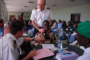 Dr. Parker with a patient.