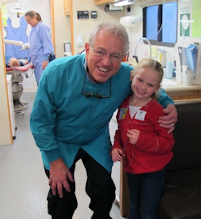 Dr. Bruce Richardson with one of his young patients. All images courtesy of Dental Foundation of Oregon.