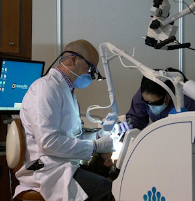 David Fantarella, DMD, uses the Solea laser on a patient. Image courtesy of Convergent Denta.