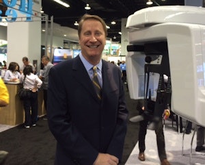 Edward Shellard, DMD, chief medical officer of Carestream Dental, at his company's booth at the CDA meeting.