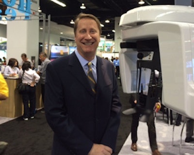 Edward Shellard, DMD, chief medical officer of Carestream Dental, at his company's booth at the CDA meeting.