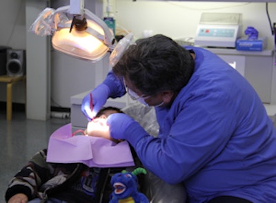 DHAT Daniel Kennedy with his first patient, Anthony Cladoosby. Image courtesy of Swinomish Indian Tribal Community.