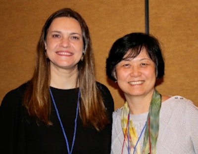 Drs. Simone Duarte, left, and Yihong Li, right, at the IADR 2017 conference.