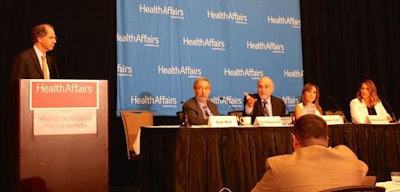 The second group of panelists discussed the oral health safety net. From left to right: Alan Weil, JD (standing); Paul Glassman, DDS, MBA; James Crall, DDS, ScD; Karen Becerra, DDS, MPH; and Laura Marcus.