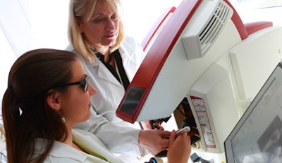 Dr. Margrit Maggio works with a student on a Simodent simulation unit at Penn Dental Medicine. Image courtesy of Penn Dental Medicine.