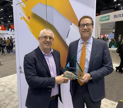 Accepting the award was Edward Shellard, DMD, Carestream Dental's chief dental officer.