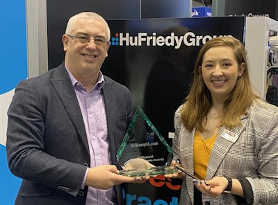 Accepting the award was Erin Baumstark, Hu-Friedy's preventive product manager.