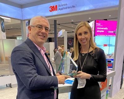 Accepting the award was Leslie Wiebler, 3M Oral Care's U.S. marketing manager.