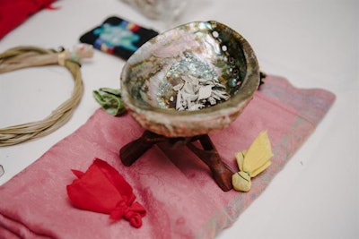Sacred indigenous objects laid out on cloth for Learning Circle Symposium in 2018. Image courtesy of Katia Taylor.