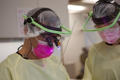 Yamaoka wears the Loupe Shield while working at his dental practice.