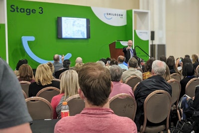 Tom Viola, RPh, speaks to a crowd at the ADA's SmileCon.