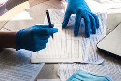 2022 03 11 01 27 0741 Doctor Fills Patient Medical Record 20220311012321