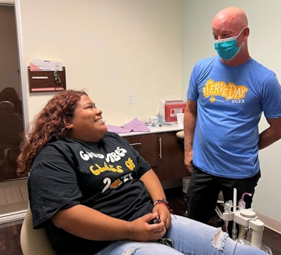 Stephen Thorne, founder and CEO of PDS, visits with a patient at Henderson Modern Dentistry in Las Vegas. Image courtesy of PDS.