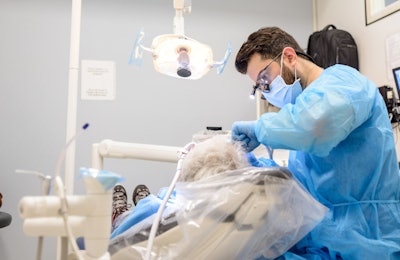 A dentist with a patient. All images courtesy of Chris Flynn/UCLA.