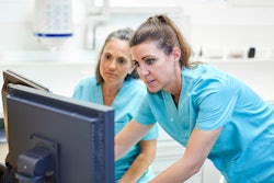 Female Dentists Computer