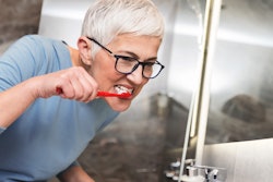 Woman Brushing Teeth