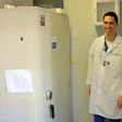 Dr. R. Uilises Melchor pictured with one of the safes that was left behind when he purchased the office space.