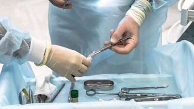Hands Dental Surgeon Instruments
