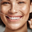 Flossing Woman