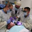 Dr. Robert H. Gregg II, founder, president, and chairman of the board at Millennium Dental Technologies, oversees the LANAP protocol on a patient at the U.S. Air Force Postgraduate Dental School. Image and caption courtesy of Millenium Dental Technologies.
