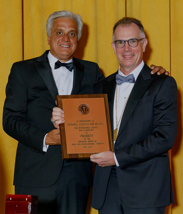 ABOMS Immediate Past President Dr. Bernard Costello is pictured right. The new president, Dr. Pushkar Mehra, is pictured left. Image courtesy of ABOMS.