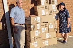 Dr. Gary Bauman and his wife, Sherri, pose with Benco Dental oral care products they delivered to soldiers in Israel. Image courtesy of the Baumans.