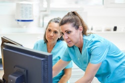 Female Dentists Computer