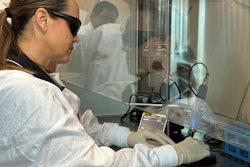 Doctoral candidate Simone Sleep tests the Nuralyte device on cells. Image courtesy of Griffith University.