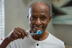 Toothbrushing Older Man