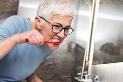 Woman Brushing Teeth