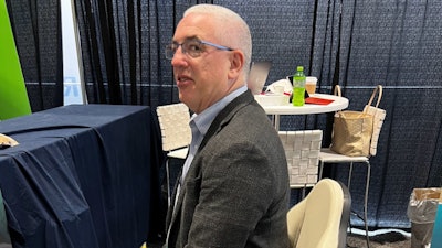 Kevin Henry tests out the Edge Gemini ergonomic chair.