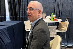 Kevin Henry tests out the Edge Gemini ergonomic chair.