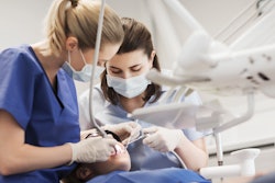 Dentist And Assistant