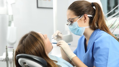 Dentist Woman Exam