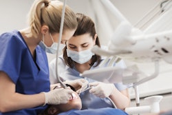 Dentist And Assistant