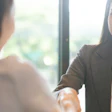 Business Woman Handshake