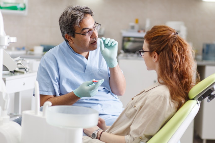Dentist Advise Patient