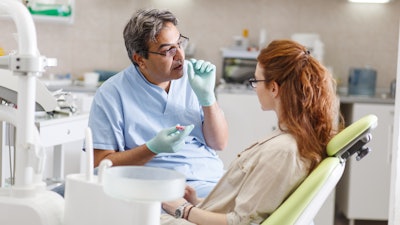 Dentist Advise Patient