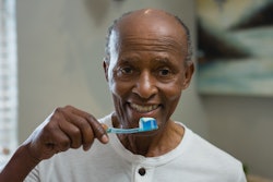 Toothbrushing Older Man