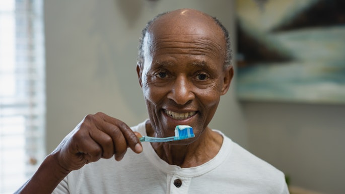 Toothbrushing Older Man