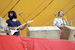 Jerry Garcia and Bob Weir of the Grateful Dead play their first show at Folsom Field, University of Colorado Boulder, on September 3, 1972. Photograph by Dan Fong. Image and caption courtesy of CU Anschutz School of Dental Medicine.