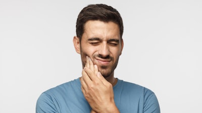 Man Jaw Tooth Pain
