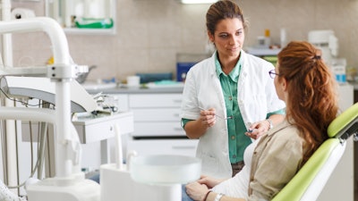 Woman Dentist Patient