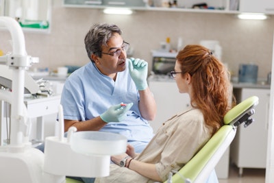Dentist Advise Patient